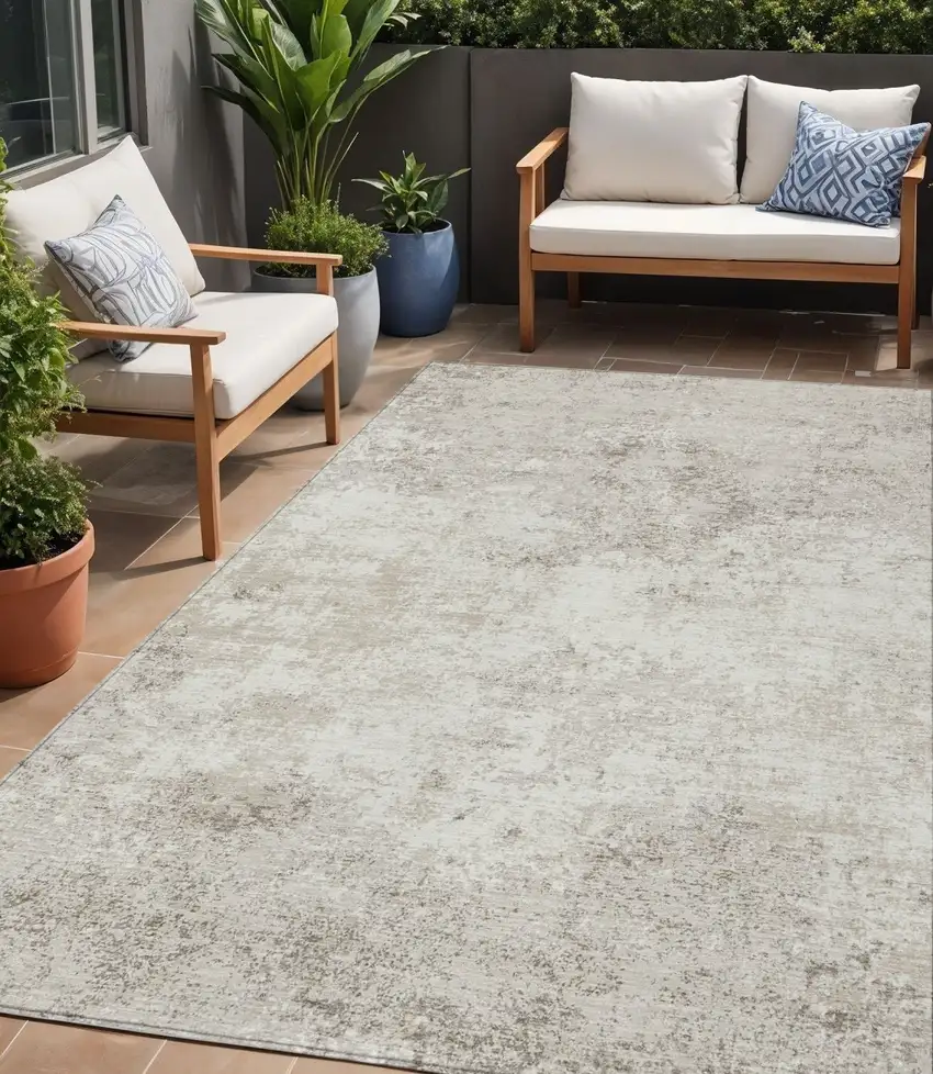 Ivory And Beige Abstract Washable Indoor Outdoor Area Rug Photo 1