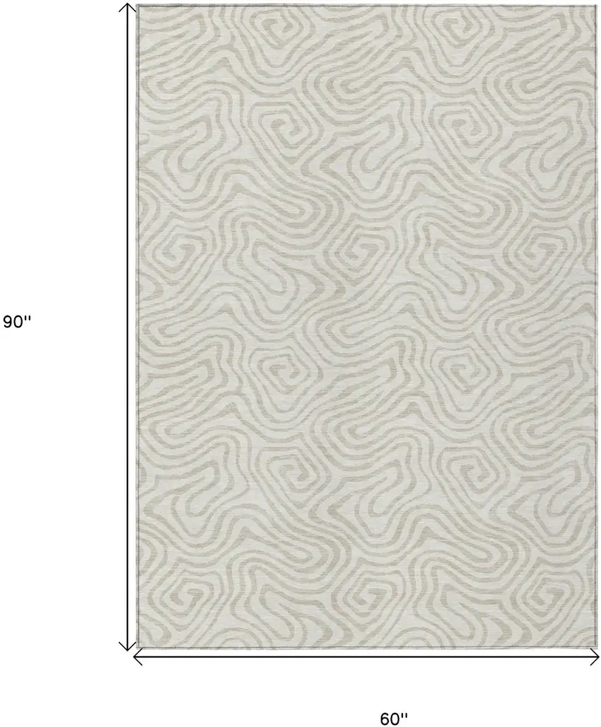 Ivory And Beige Abstract Washable Indoor Outdoor Area Rug Photo 3