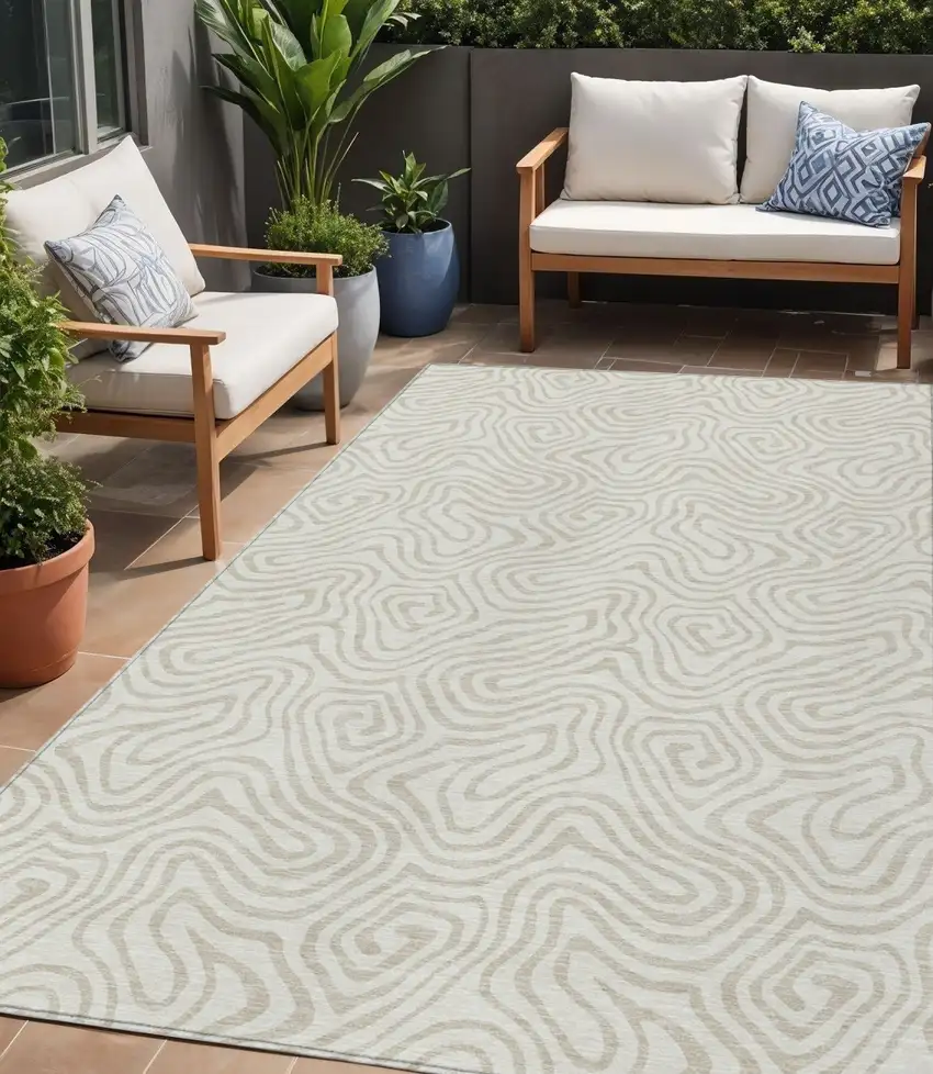 Ivory And Beige Abstract Washable Indoor Outdoor Area Rug Photo 1