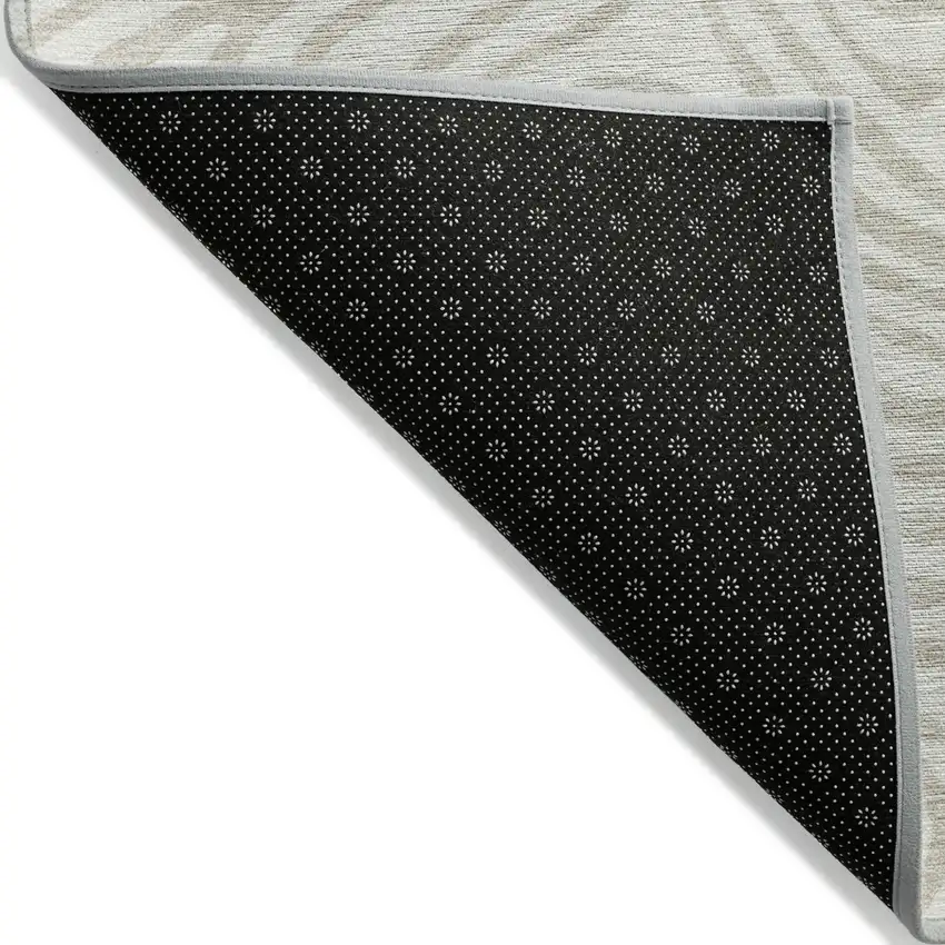 Ivory And Beige Abstract Washable Indoor Outdoor Area Rug Photo 4