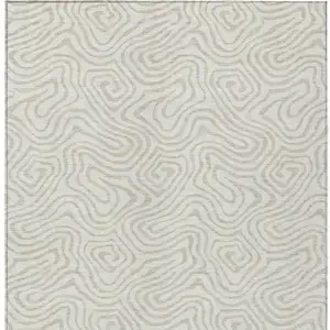 Photo of Ivory And Beige Abstract Washable Indoor Outdoor Area Rug