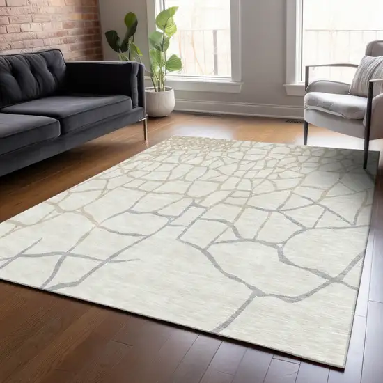 Ivory And Beige Abstract Washable Indoor Outdoor Area Rug Photo 8