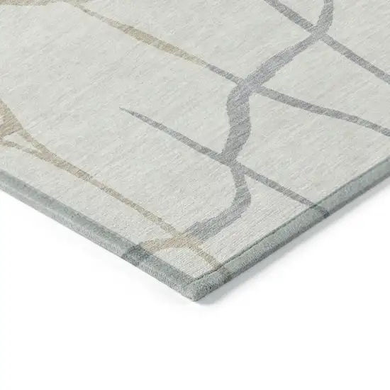 Ivory And Beige Abstract Washable Indoor Outdoor Area Rug Photo 4