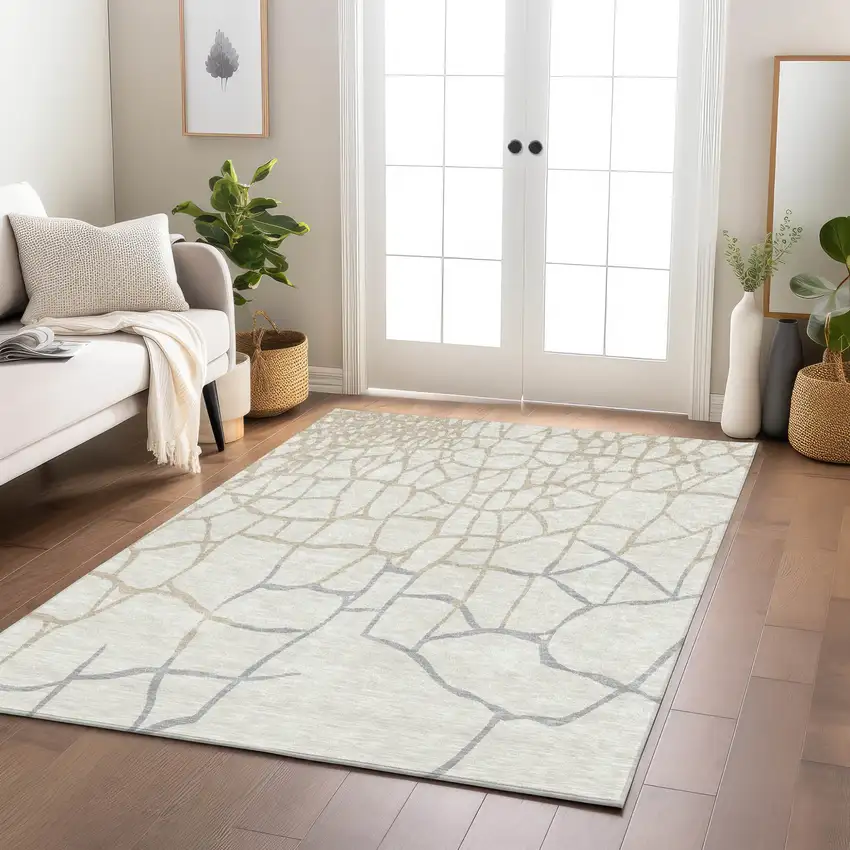 Ivory And Beige Abstract Washable Indoor Outdoor Area Rug Photo 9