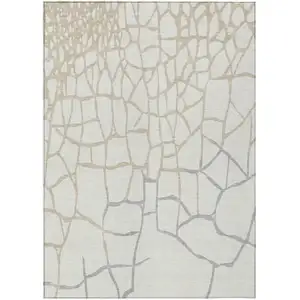 Photo of Ivory And Beige Abstract Washable Indoor Outdoor Area Rug