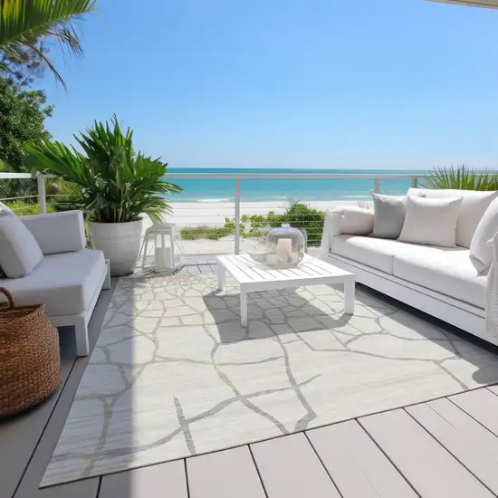 Ivory And Beige Abstract Washable Indoor Outdoor Area Rug Photo 9