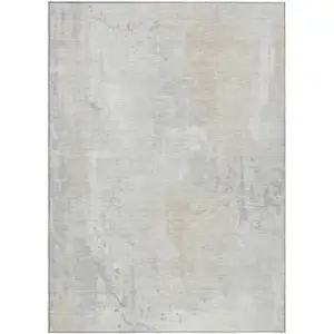 Photo of Ivory And Beige Abstract Washable Indoor Outdoor Area Rug