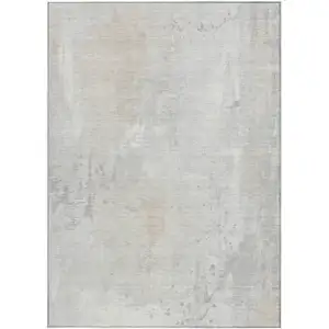 Photo of Ivory And Beige Abstract Washable Indoor Outdoor Area Rug
