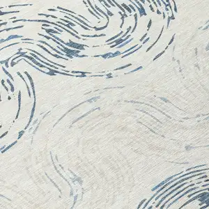 Photo of Ivory And Beige Abstract Washable Indoor Outdoor Area Rug