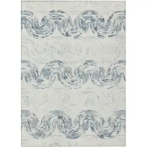 Photo of Ivory And Beige Abstract Washable Indoor Outdoor Area Rug