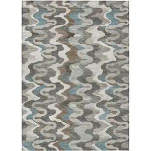 Photo of Ivory And Beige Abstract Washable Indoor Outdoor Area Rug