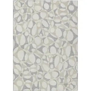 Photo of Ivory And Beige Abstract Washable Indoor Outdoor Area Rug