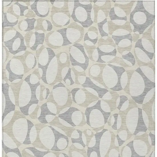 Ivory And Beige Abstract Washable Indoor Outdoor Area Rug Photo 3