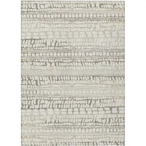 Photo of Ivory And Beige Abstract Washable Indoor Outdoor Area Rug