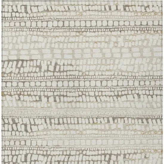 Ivory And Beige Abstract Washable Indoor Outdoor Area Rug Photo 3
