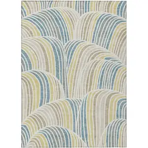 Photo of Ivory And Beige Abstract Washable Indoor Outdoor Area Rug