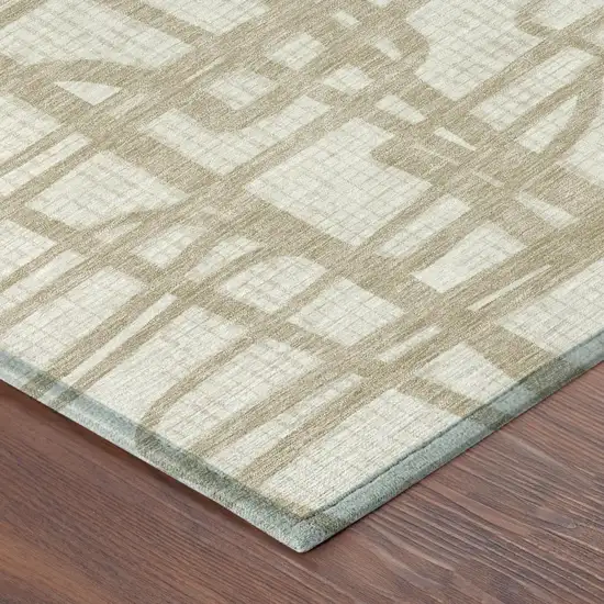 Ivory And Beige Abstract Washable Indoor Outdoor Area Rug Photo 5