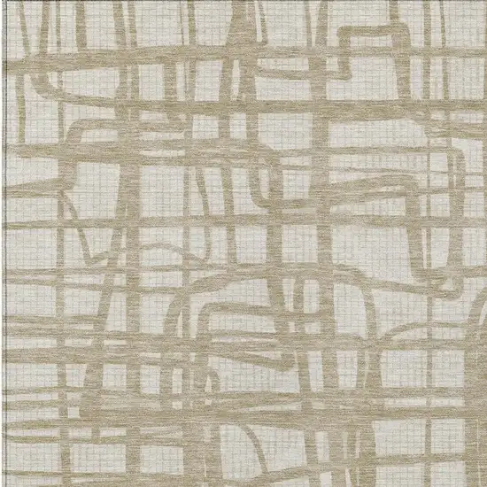 Ivory And Beige Abstract Washable Indoor Outdoor Area Rug Photo 3