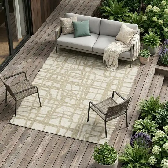 Ivory And Beige Abstract Washable Indoor Outdoor Area Rug Photo 1