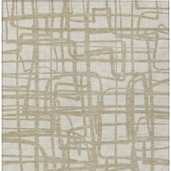 Ivory And Beige Abstract Washable Indoor Outdoor Area Rug Photo 4