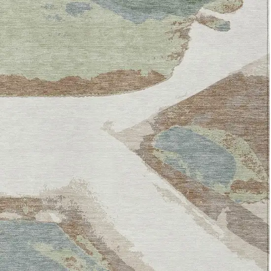 Ivory And Beige Abstract Washable Indoor Outdoor Area Rug Photo 3