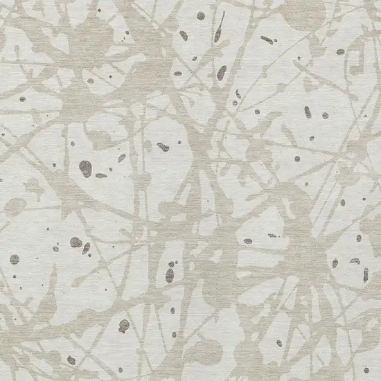 Ivory And Beige Abstract Washable Indoor Outdoor Area Rug Photo 2