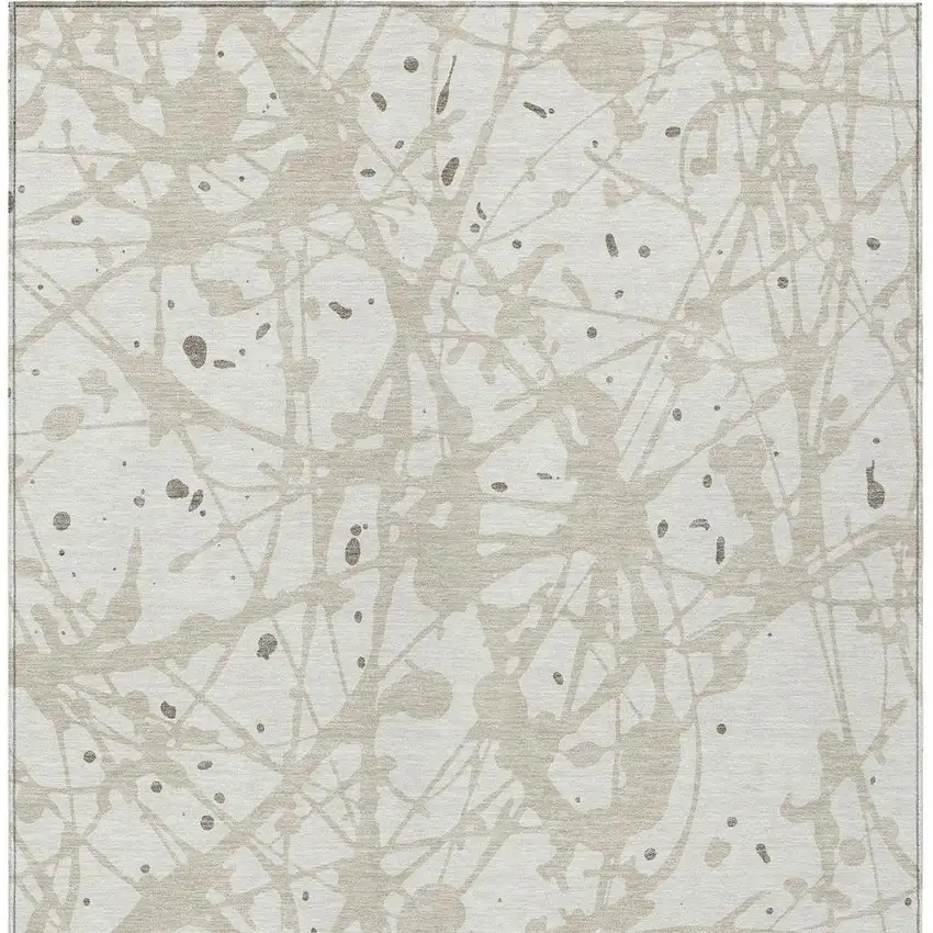Ivory And Beige Abstract Washable Indoor Outdoor Area Rug Photo 3