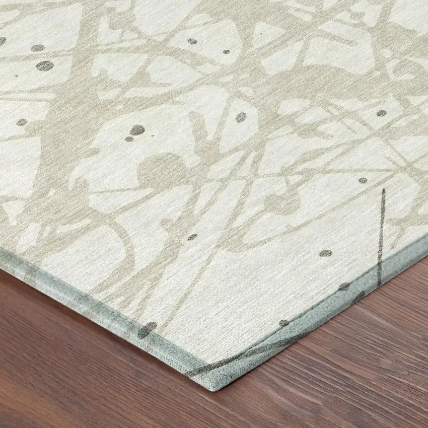 Ivory And Beige Abstract Washable Indoor Outdoor Area Rug Photo 4
