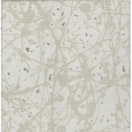 Ivory And Beige Abstract Washable Indoor Outdoor Area Rug Photo 3