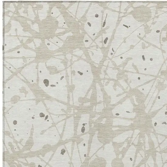 Ivory And Beige Abstract Washable Indoor Outdoor Area Rug Photo 2