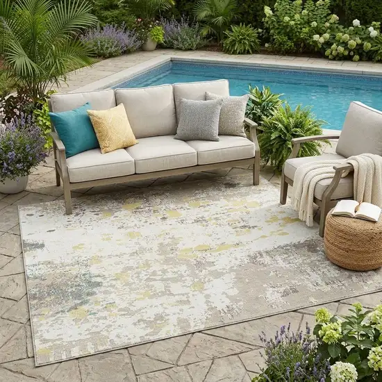 Ivory And Beige Abstract Washable Indoor Outdoor Area Rug Photo 1
