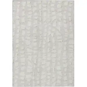 Photo of Ivory And Beige Abstract Washable Indoor Outdoor Area Rug