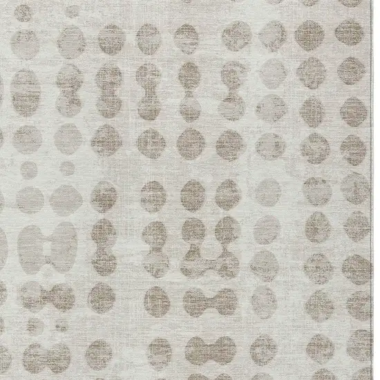 Ivory And Beige Abstract Washable Indoor Outdoor Area Rug Photo 6
