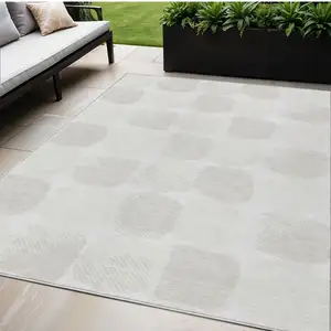 Photo of Ivory And Beige Abstract Washable Indoor Outdoor Area Rug