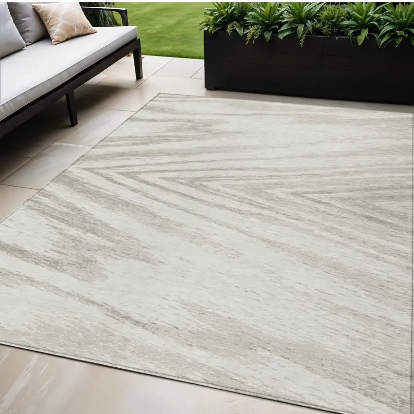 Ivory And Beige Abstract Washable Indoor Outdoor Area Rug Photo 1
