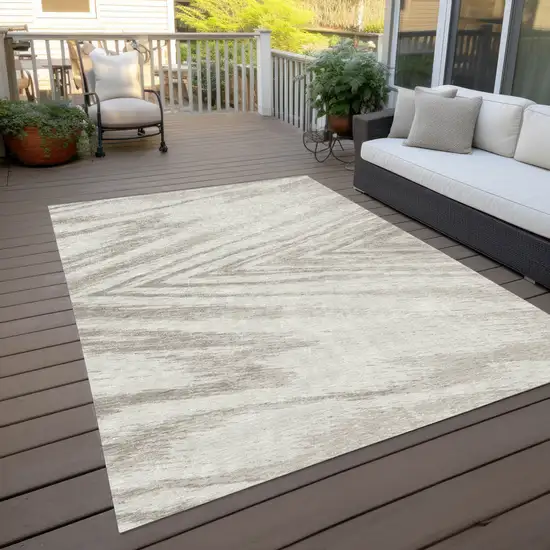 Ivory And Beige Abstract Washable Indoor Outdoor Area Rug Photo 9