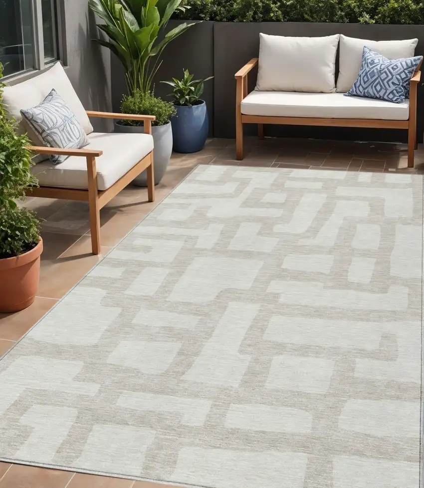 Ivory And Beige Abstract Washable Indoor Outdoor Area Rug Photo 1