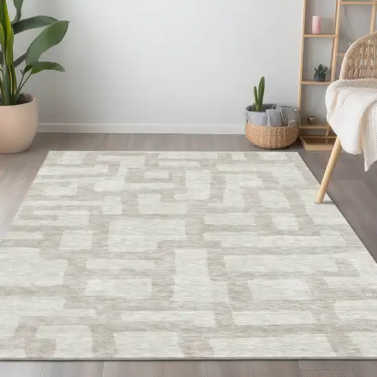 Ivory And Beige Abstract Washable Indoor Outdoor Area Rug Photo 9