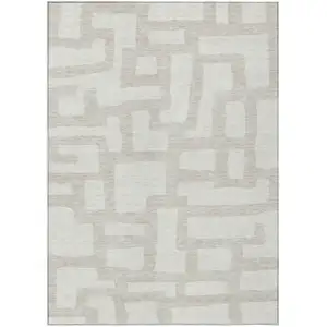 Photo of Ivory And Beige Abstract Washable Indoor Outdoor Area Rug
