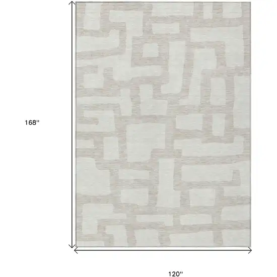 Ivory And Beige Abstract Washable Indoor Outdoor Area Rug Photo 3