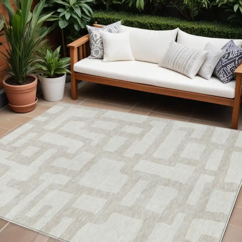 Ivory And Beige Abstract Washable Indoor Outdoor Area Rug Photo 1