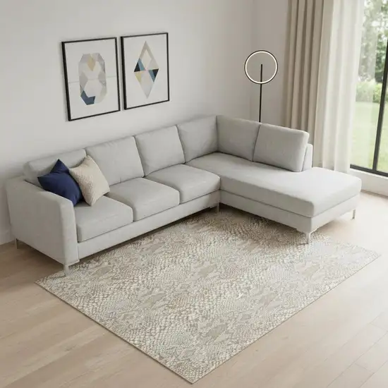 Ivory And Beige Animal Print Distressed Area Rug Photo 1