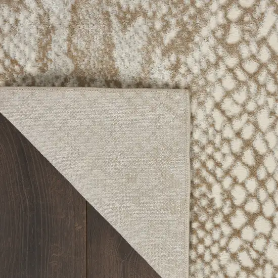 Ivory And Beige Animal Print Distressed Area Rug Photo 9