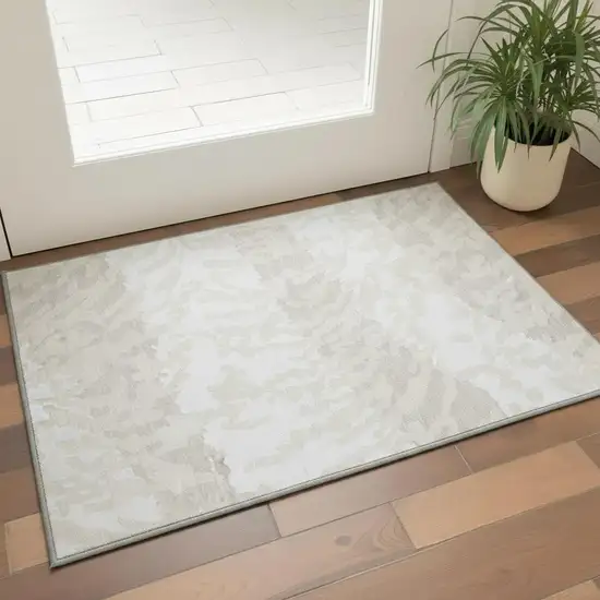 Ivory And Beige Animal Print Washable Area Rug With UV Protection Photo 2