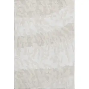 Photo of Ivory And Beige Animal Print Washable Area Rug With UV Protection