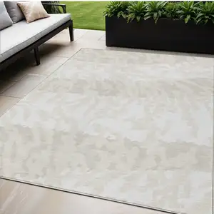 Photo of Ivory And Beige Animal Print Washable Indoor Outdoor Area Rug