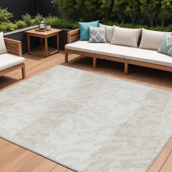 Ivory And Beige Animal Print Washable Indoor Outdoor Area Rug Photo 1