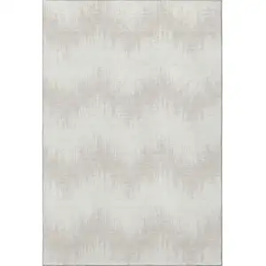 Photo of Ivory And Beige Chevron Washable Area Rug With UV Protection