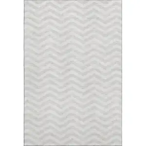 Photo of Ivory And Beige Chevron Washable Area Rug With UV Protection