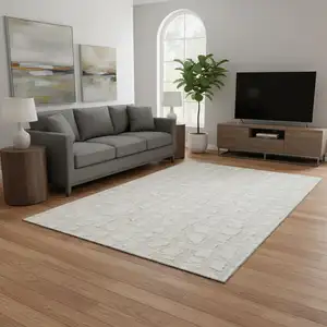 Photo of Ivory And Beige Cobblestone Washable Area Rug With UV Protection